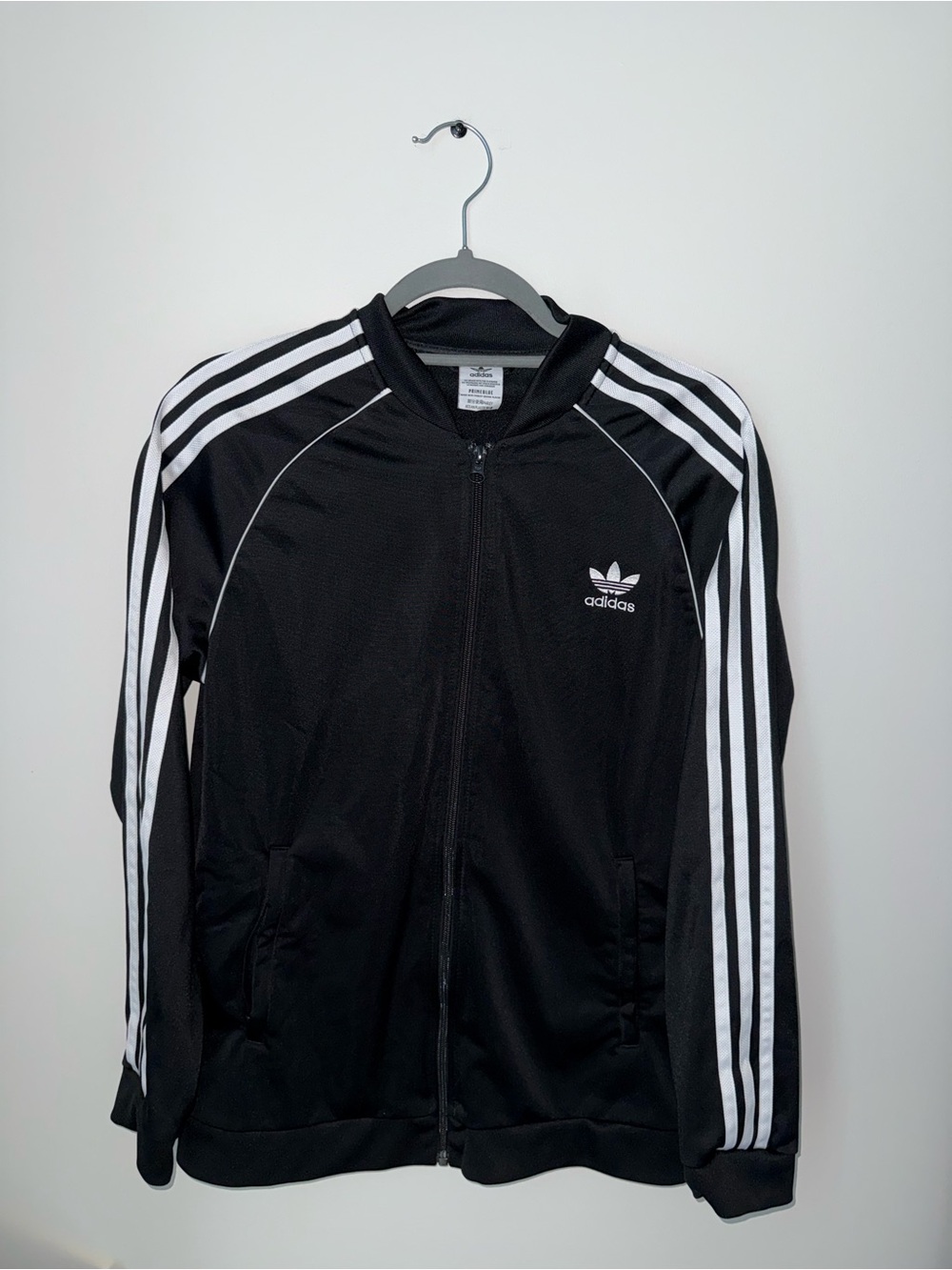 adidas Black Track Jacket with White Three-Stripe Sleeve Detail